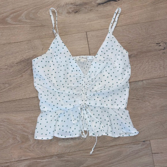 Patterned white tank top/crop top with green star pattern, size XS - Picture 1 of 1